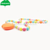 HeaLeanLo food grade silicone apple shape teether best natural baltic amber baby boy teething necklace for sale