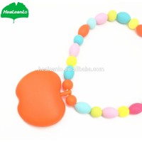 HeaLeanLo food grade silicone apple shape teether the amber necklace pendant infant teething toys